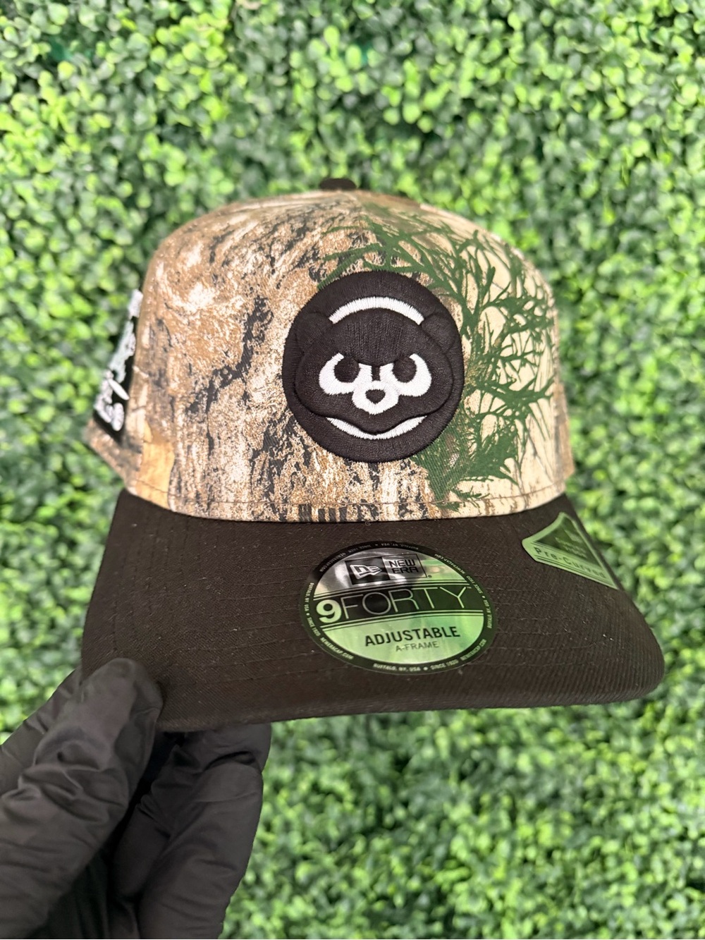 New Era Kids Camo Cap with Black Brim and Green Accents